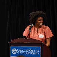 committee member speaking at podium